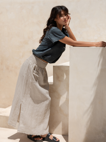 Model wears Aurora French Linen Skirt in Flax