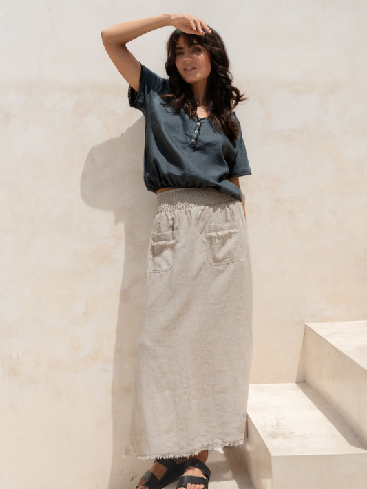 Model wears Aurora French Linen Skirt in Flax